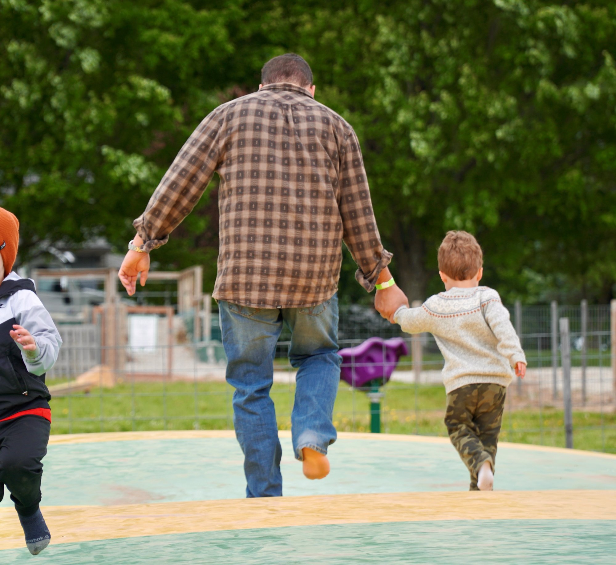 father and son on jumper